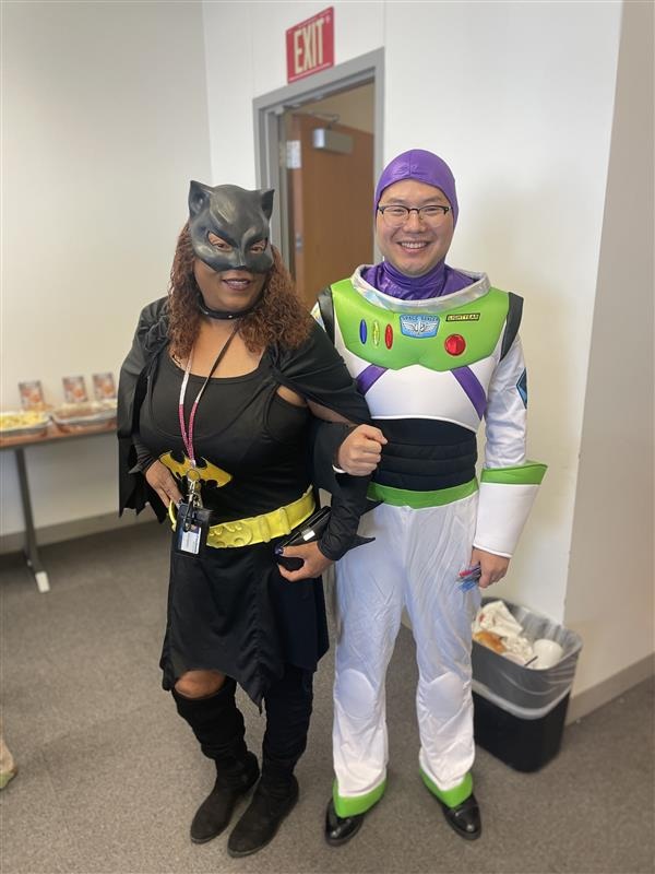 Two Choi Lab members posing in Halloween costumes.